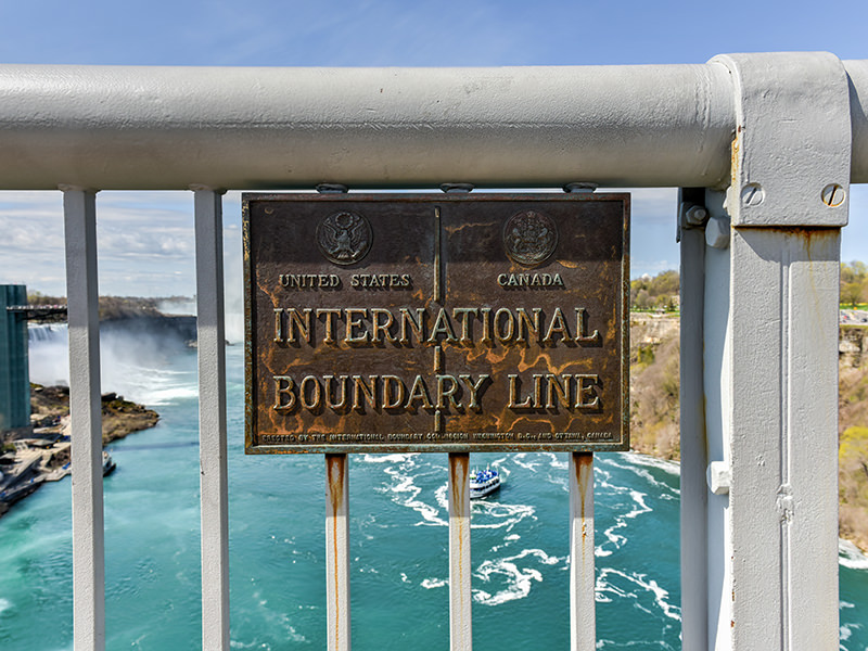 Canada-USA international boundary marker between on the Rainbow Bridge at Niagara Falls